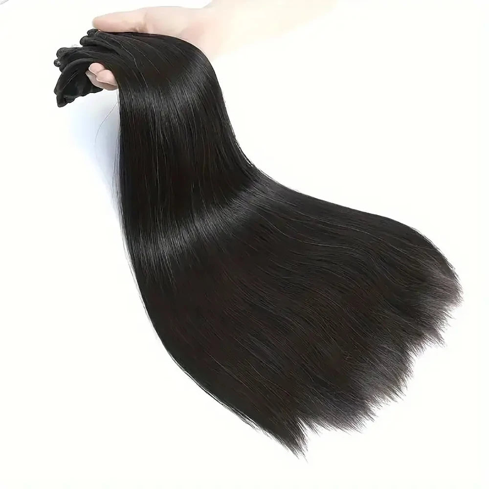 Tissage Noir Vietnamien Lisse – Virgin Hair dans une main